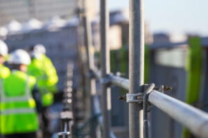 Silhouette Construction workers on a scaffold